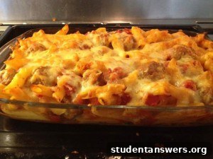 A delicious and simple cheesy pasta bake in a white baking dish
