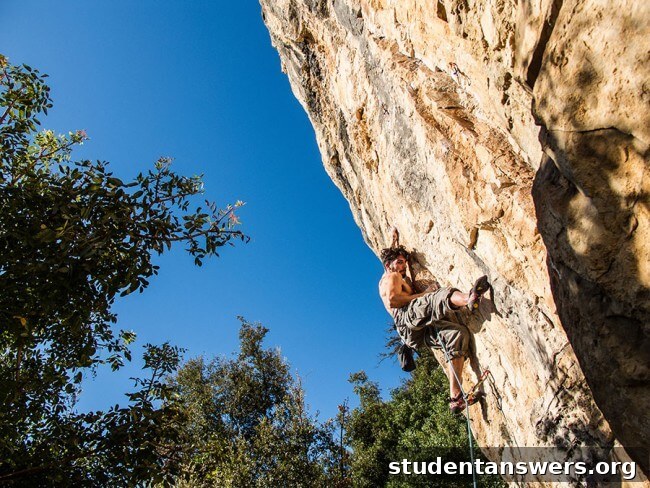A lone mountain climber ascending a steep, snowy peak, representing the challenge and reward of doing hard things.