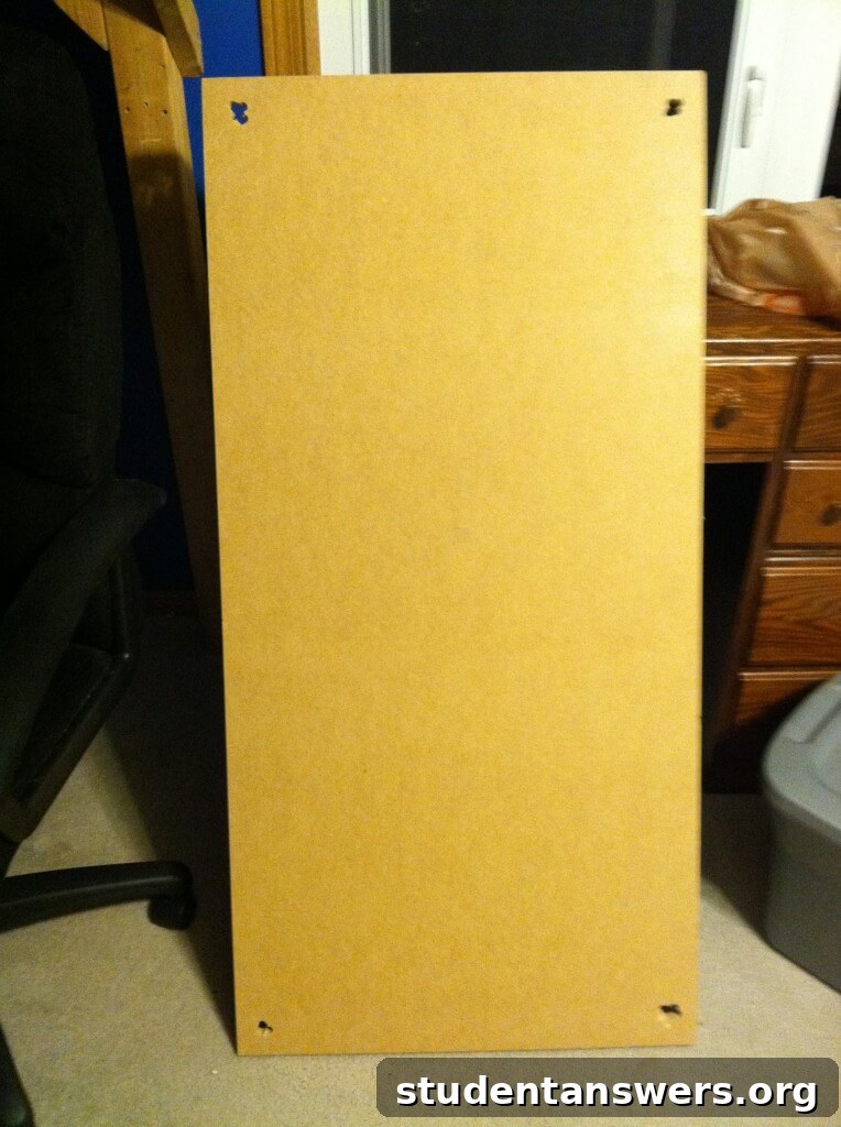 A rectangular piece of high-density fiberboard that will serve as the desktop surface.