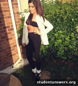 Close-up of a bandeau top and blazer outfit, showcasing layering.