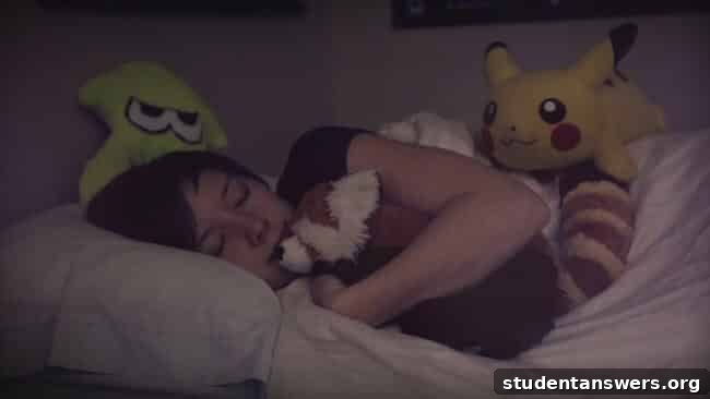 A person sleeping peacefully in a dark, comfortable bed
