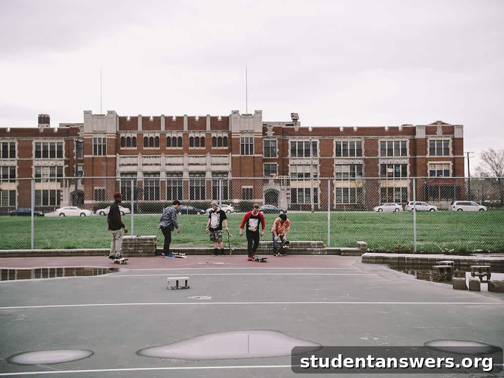 A group of skateboarders hanging out together on a sunny day.