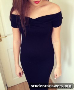 Full-length view of the off-the-shoulder dress highlighting its silhouette.
