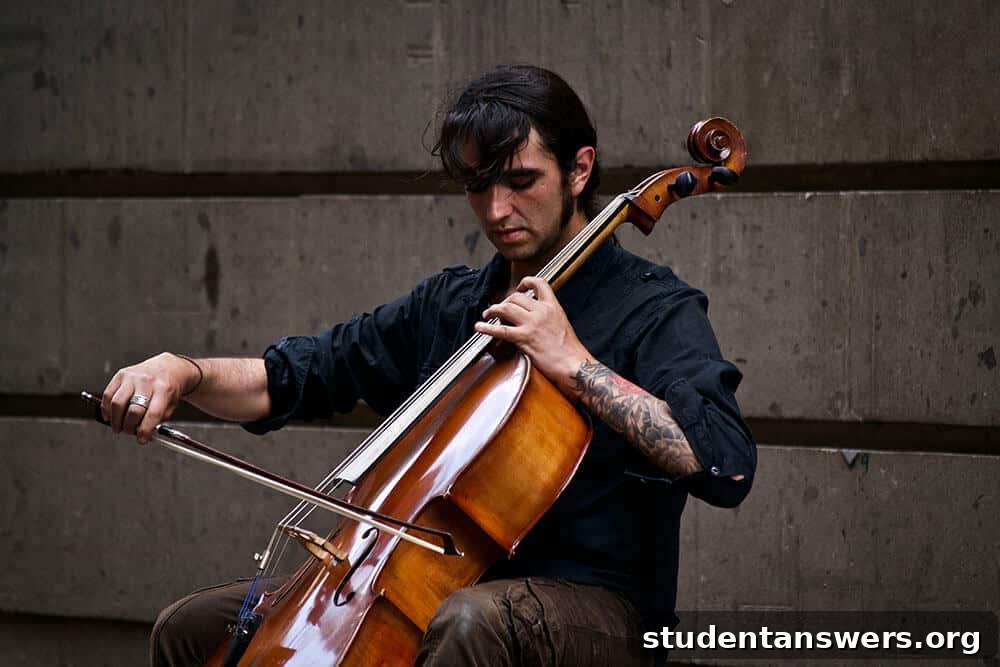A man playing the cello with focused intensity