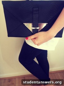 The stylish and textured Snake Skin Effect Envelope Clutch bag.