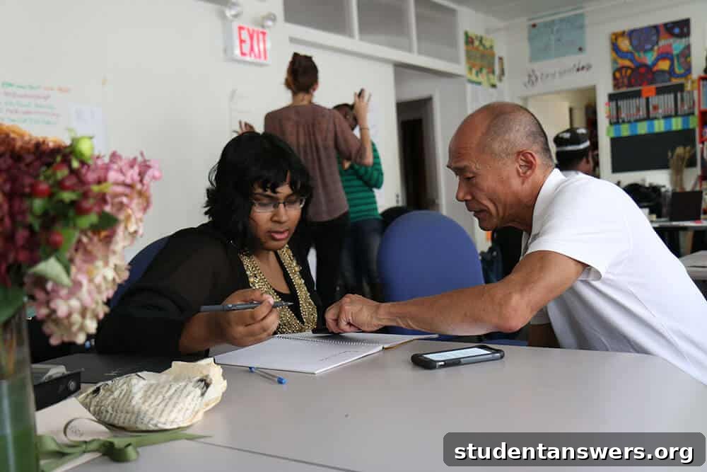 A career advisor helping a student with their resume.