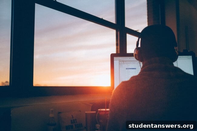A person wearing headphones while watching a sunset