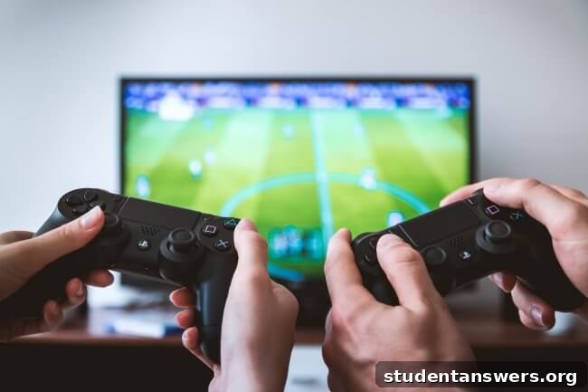 Two video game controllers on a table in front of a sports game on TV