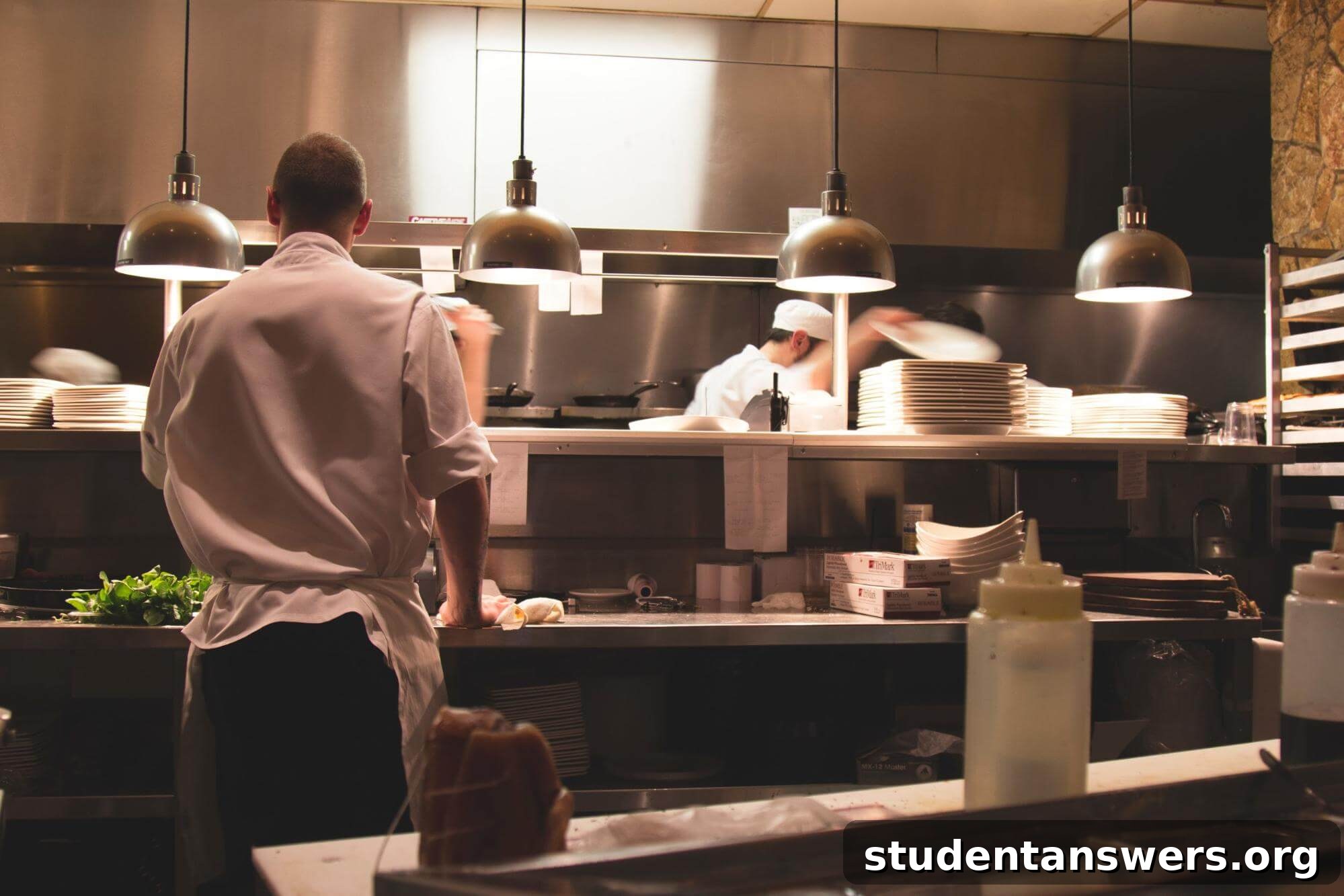 Professional chefs working in a clean, organized kitchen
