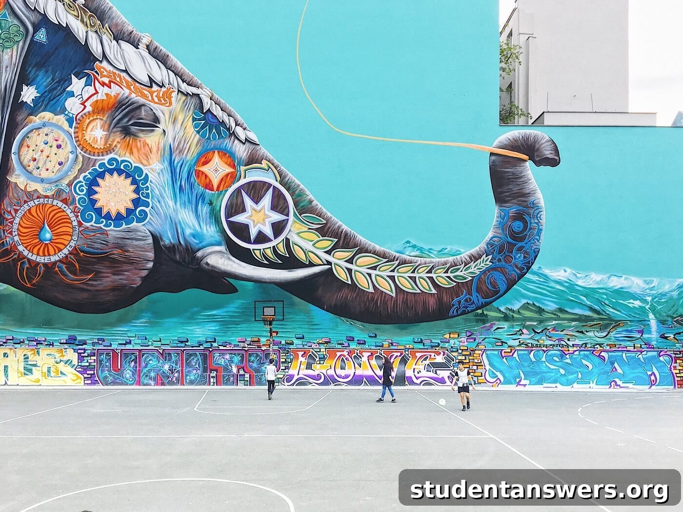 A colorful and abstract mural of an elephant's head, alluding to the parable of the blind men and the elephant.