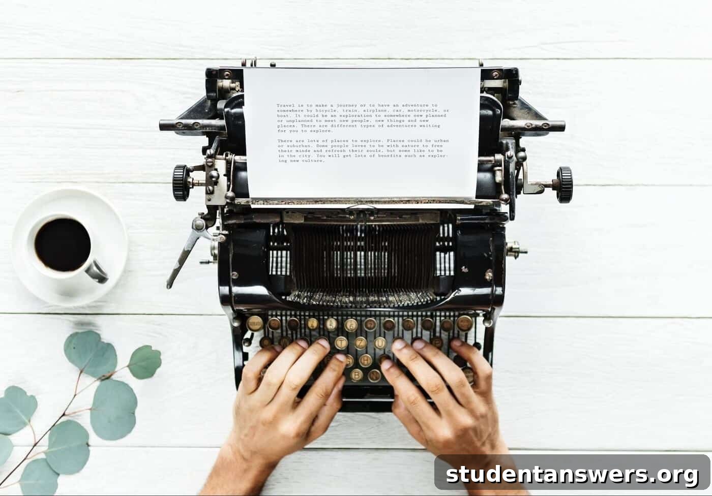 A person typing on a vintage typewriter, representing the craft of writing an essay.