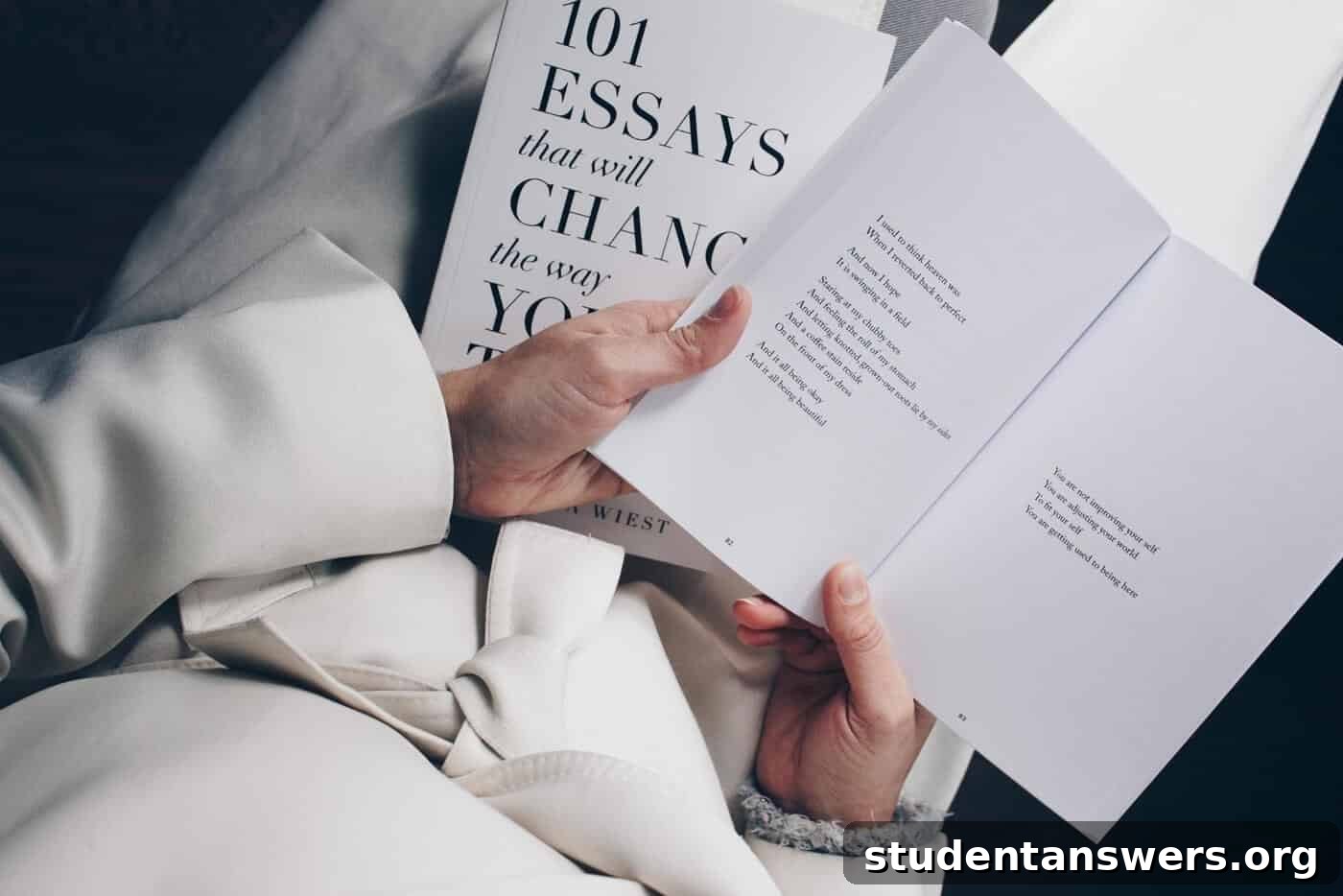 A pair of glasses resting on an open book, symbolizing the final review and editing process.
