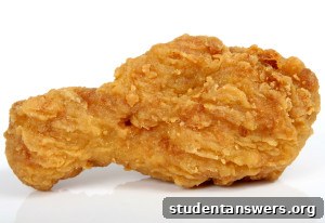 Crispy panko chicken sliced on a cutting board with a side of sweet chili dipping sauce