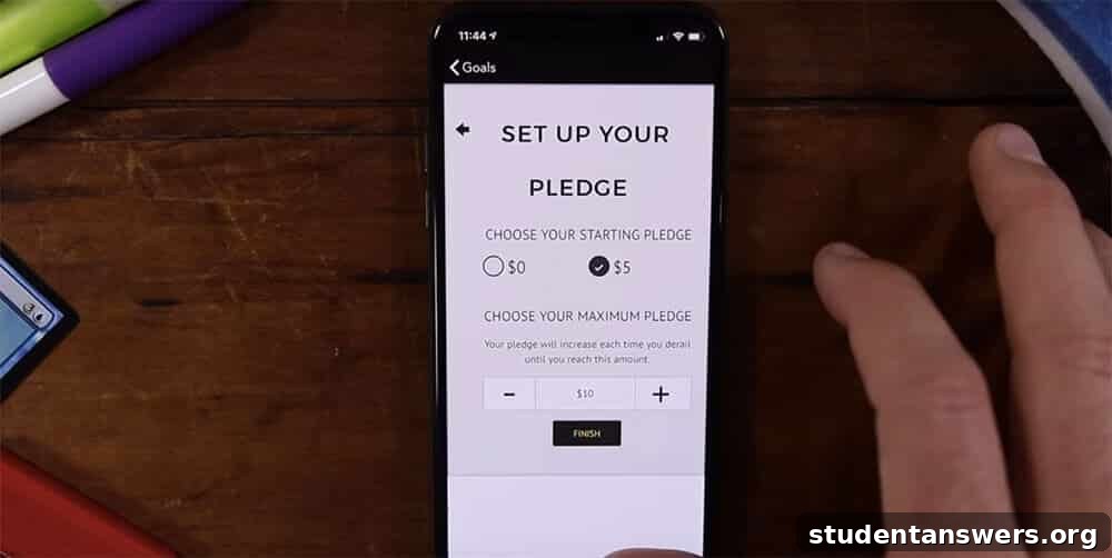 Setting up a new goal in the Beeminder app, with options to set a financial pledge for accountability.