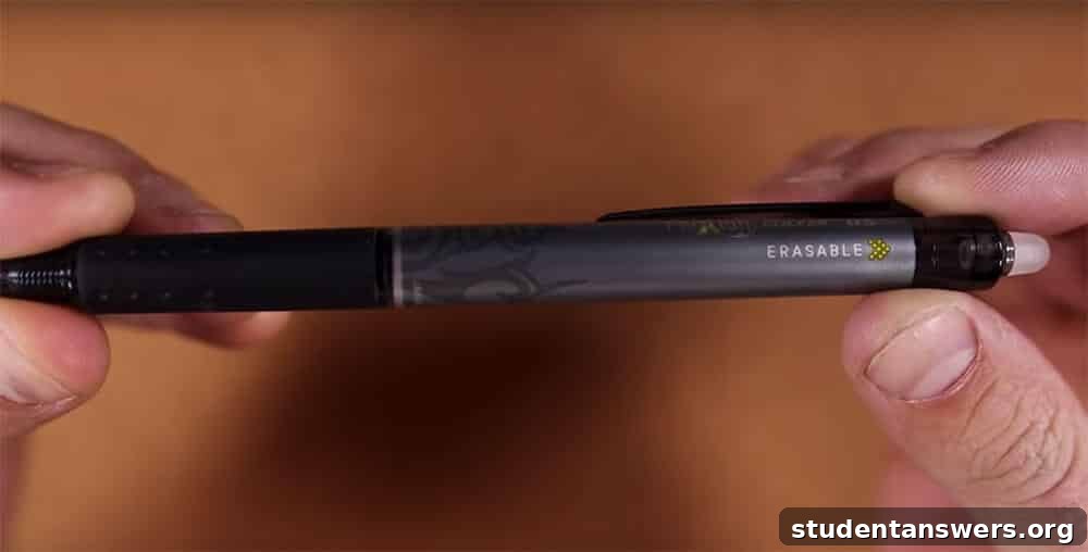 A Pilot FriXion pen placed on top of an open Rocketbook notebook