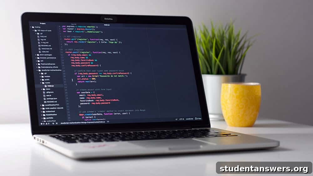 Laptop displaying JavaScript code for web development