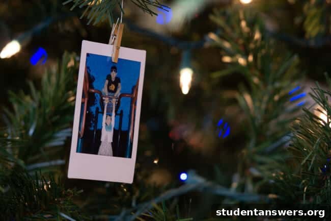 A Christmas tree decorated with small, instant-print photos, showing a creative way to display memories.