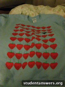 A person wearing a stylish and comfortable retro jumper from Qcumber Clothing