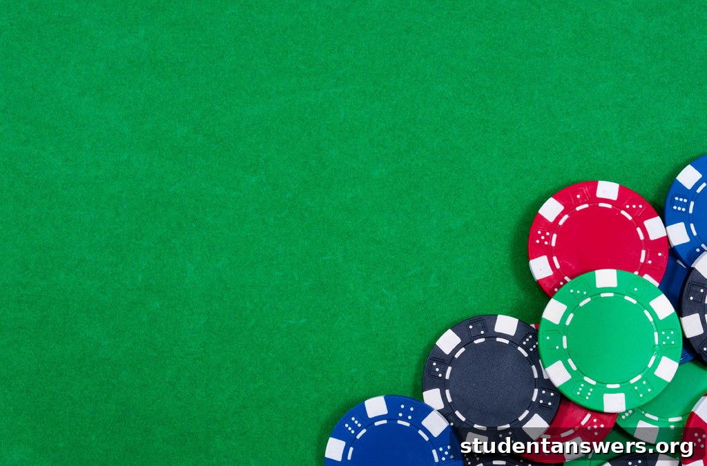 Poker chips and playing cards arranged on a green felt table, representing a high-stakes game.