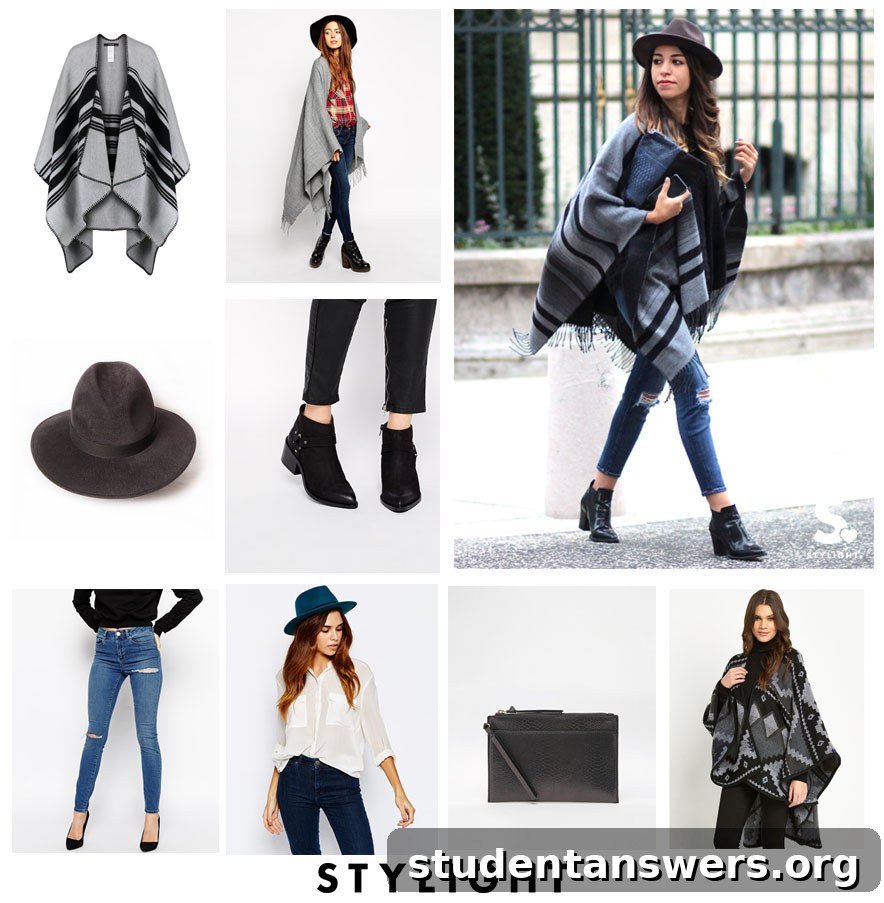 A woman wearing a grey patterned poncho-style oversized scarf with ripped skinny jeans and a black fedora hat