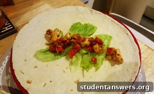 A delicious spicy chicken and pepper wrap made with Very Lazy ingredients