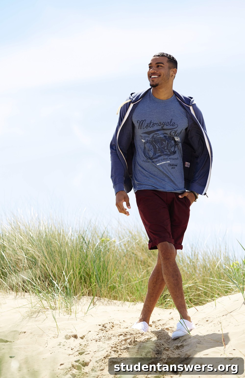 A man wearing an Aldi grey marl zipped hoodie