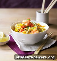 A delicious bowl of homemade Singapore noodles with prawns and vegetables