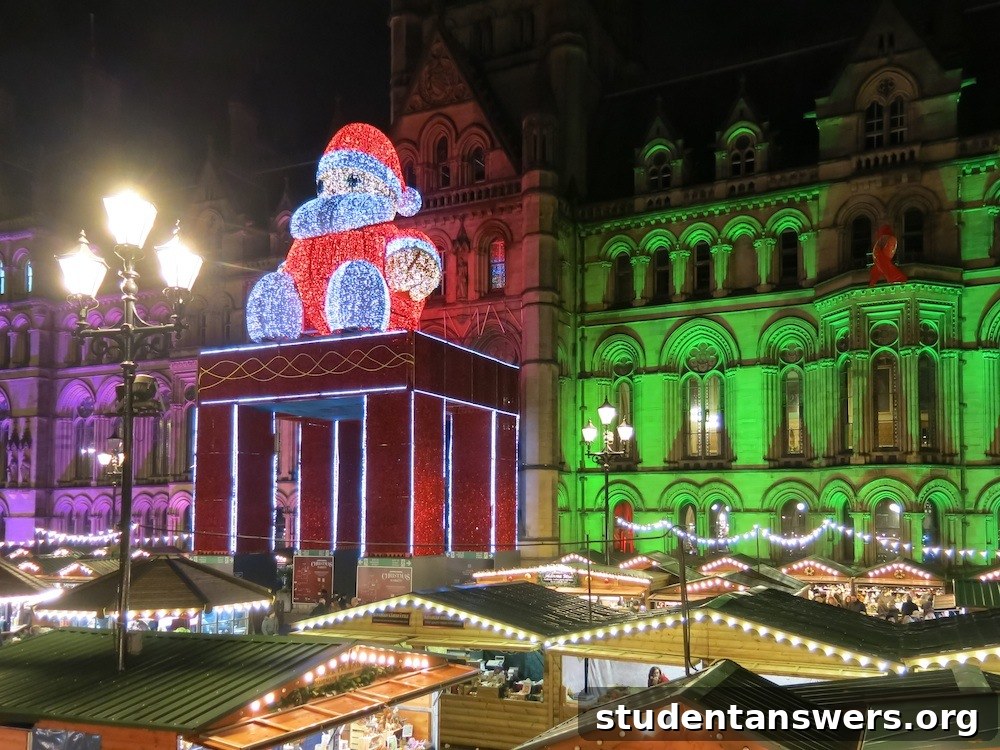 Manchester's Christmas Market illuminated beautifully at night