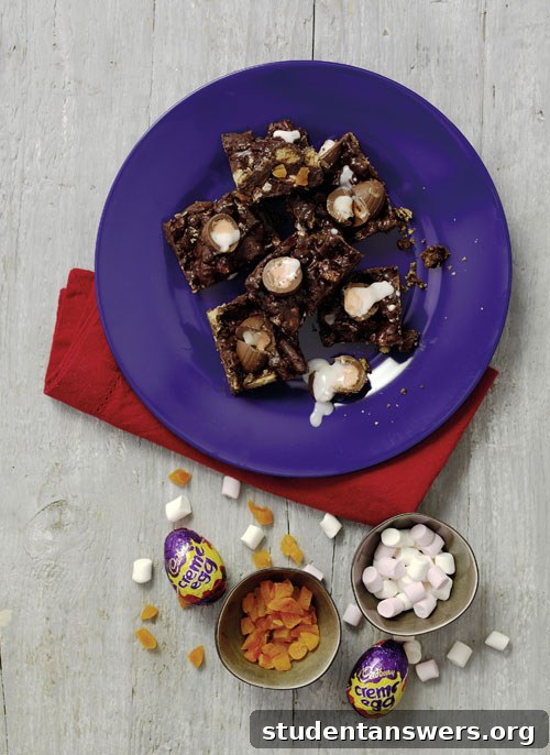Squares of dark chocolate rocky road packed with marshmallows, apricots, and mini Creme Eggs.