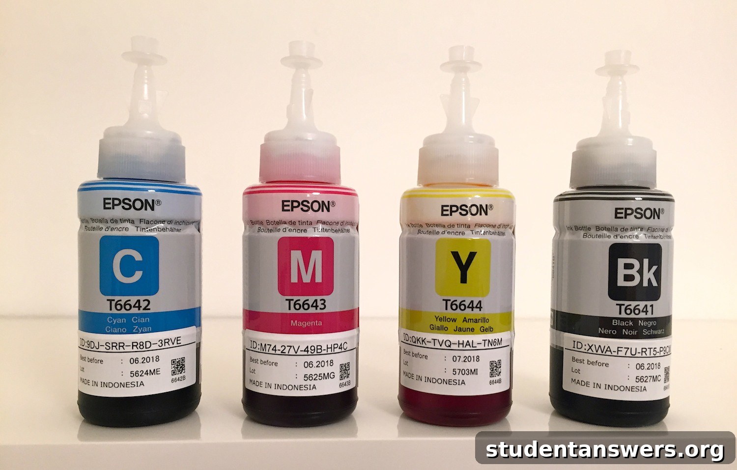 A collection of Epson EcoTank ink refill bottles