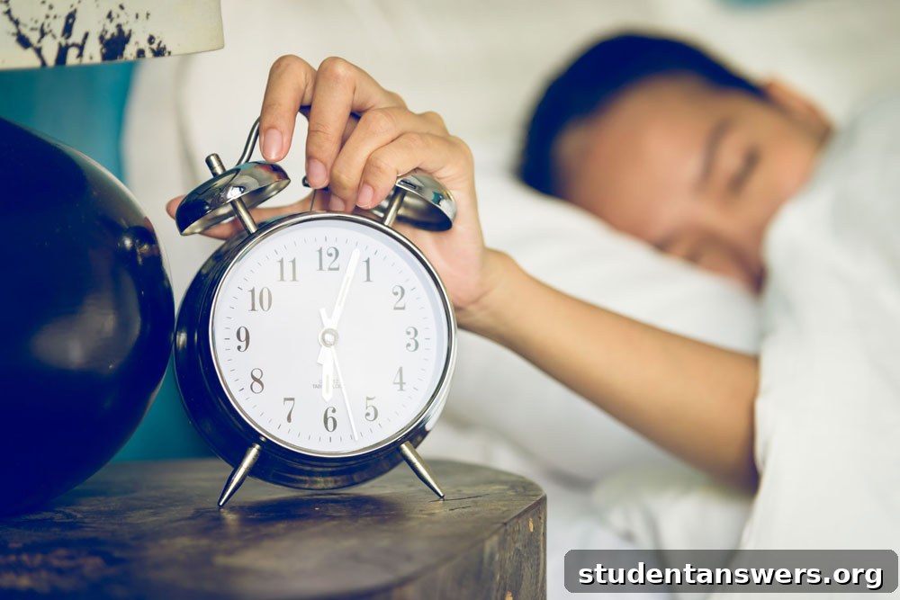 A comfortable student bed with an alarm clock, symbolizing the importance of a good night's sleep for academic success.