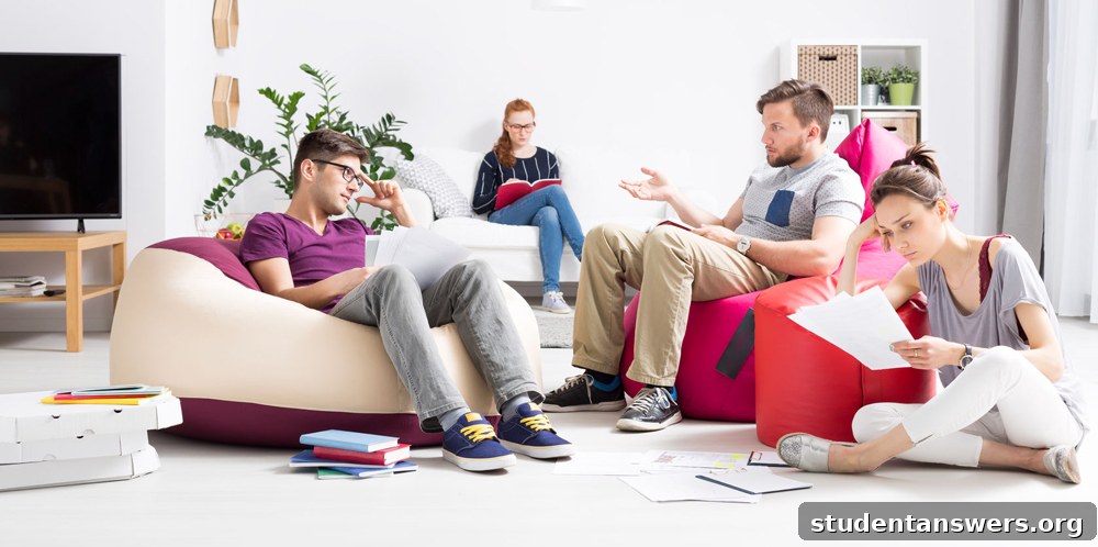 A group of friends and flatmates laughing together in their shared living room.