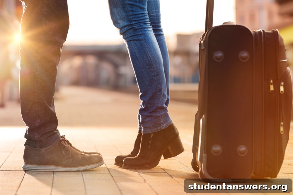 University students with a suitcase planning their affordable UK travel