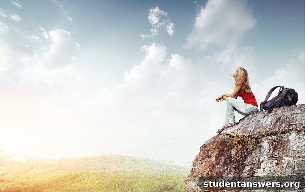 A student looking at a world map, planning a gap year or post-university travel