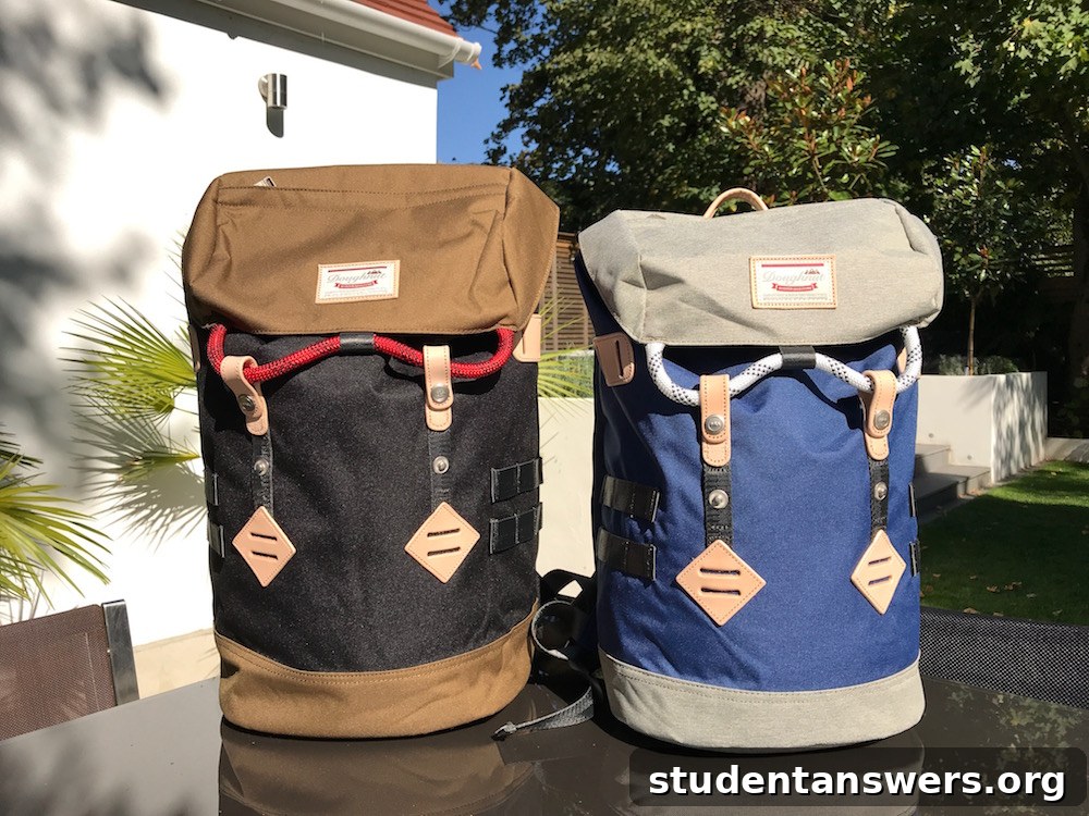 Front view of the black and khaki Doughnut Colorado backpack