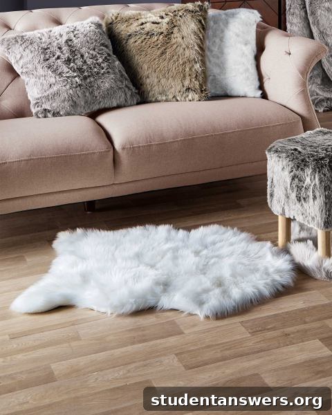 A plush white faux sheepskin rug adding warmth to a room