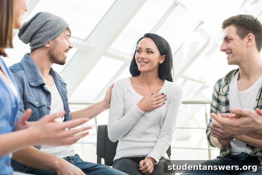 A supportive group of university students talking together