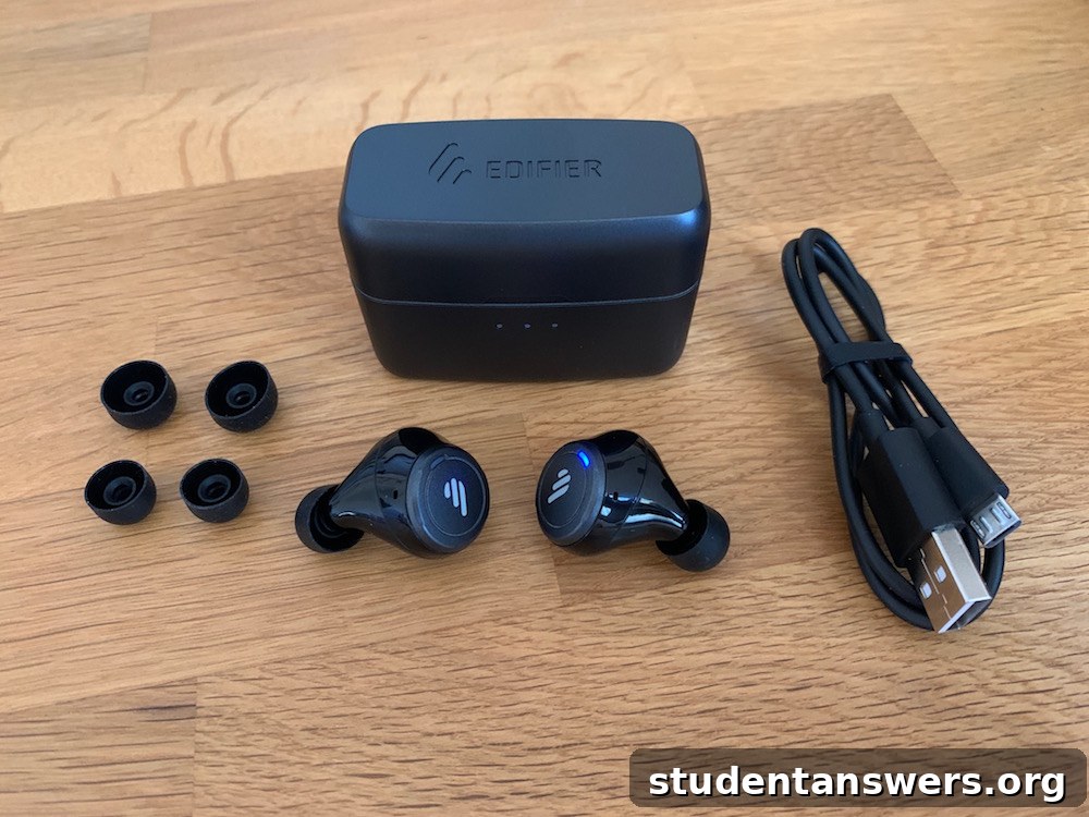 Close-up of the Edifier TWS5 earbuds and their charging case