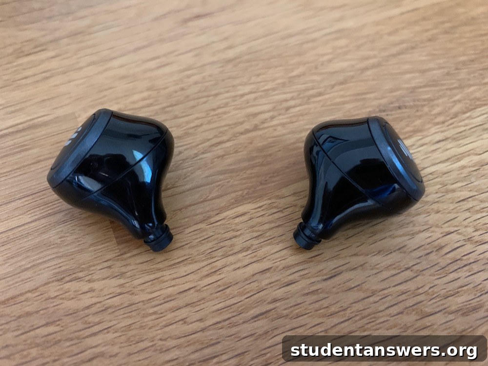 A person wearing the Edifier TWS5 wireless earbuds